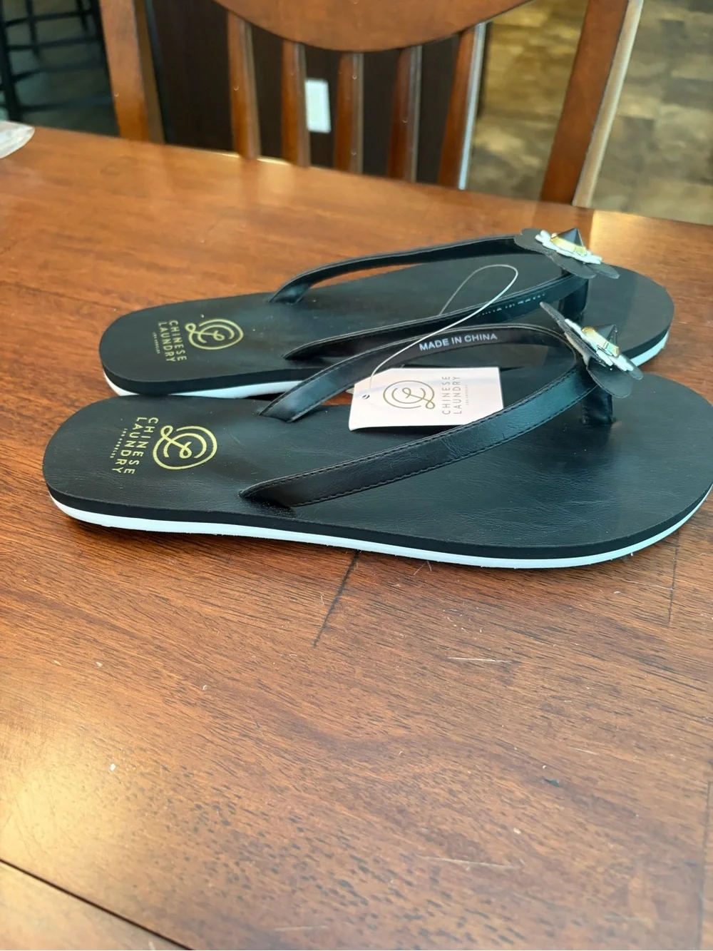 Chinese Laundry Black Floral Toe-Post Sandals with Gold Accent